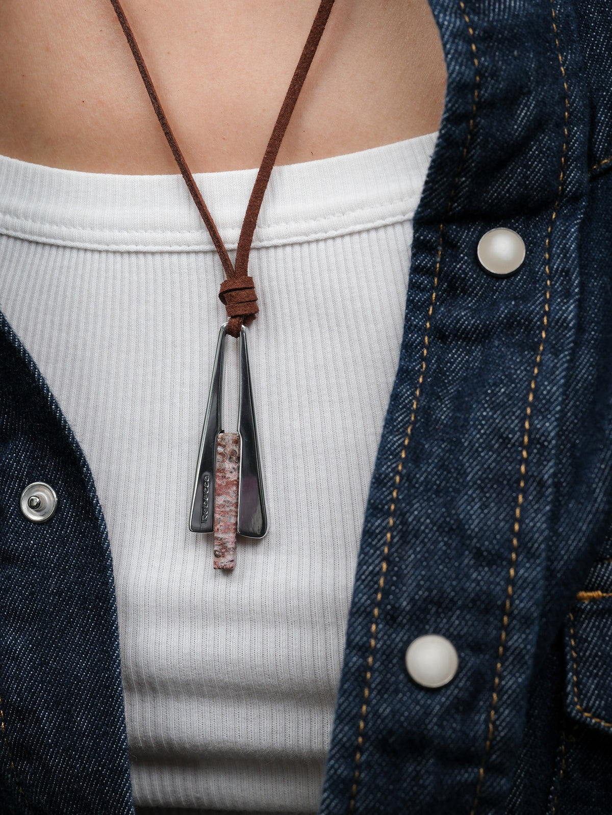 Necklace with irregular pyramid pendant and natural stone