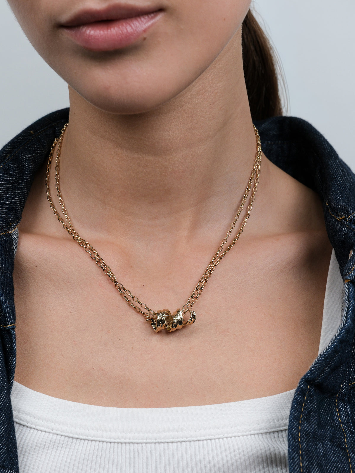 Necklace with curl design