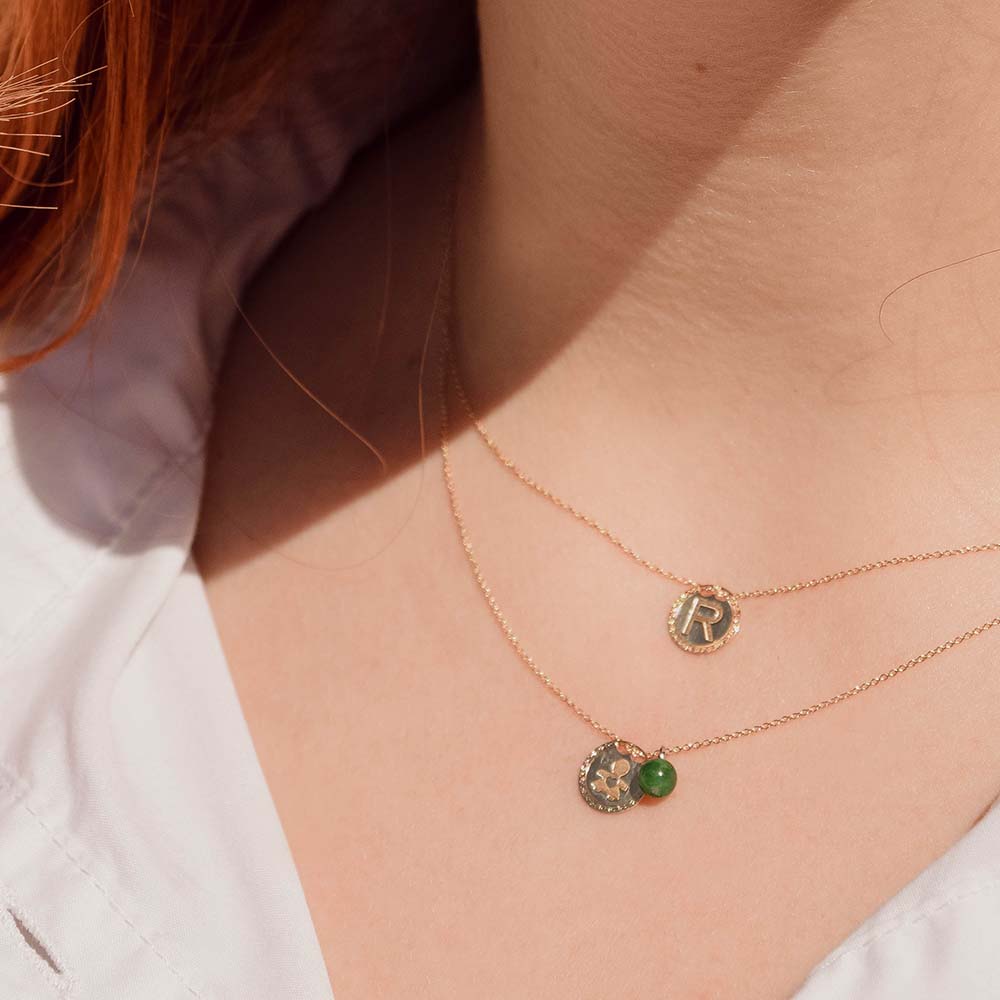 Collana in oro 18 kt con medaglia Iniziale