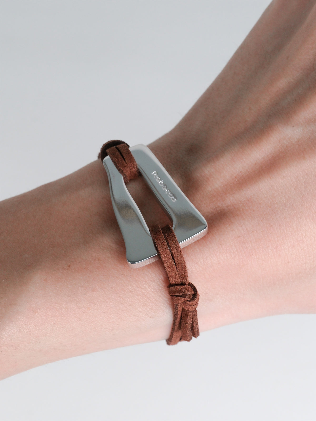 Bracciale con triangolo irregolare