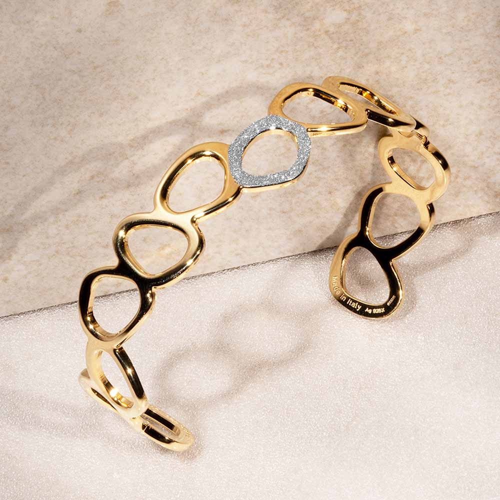 Bracciale rigido con ovale in polvere di diamanti